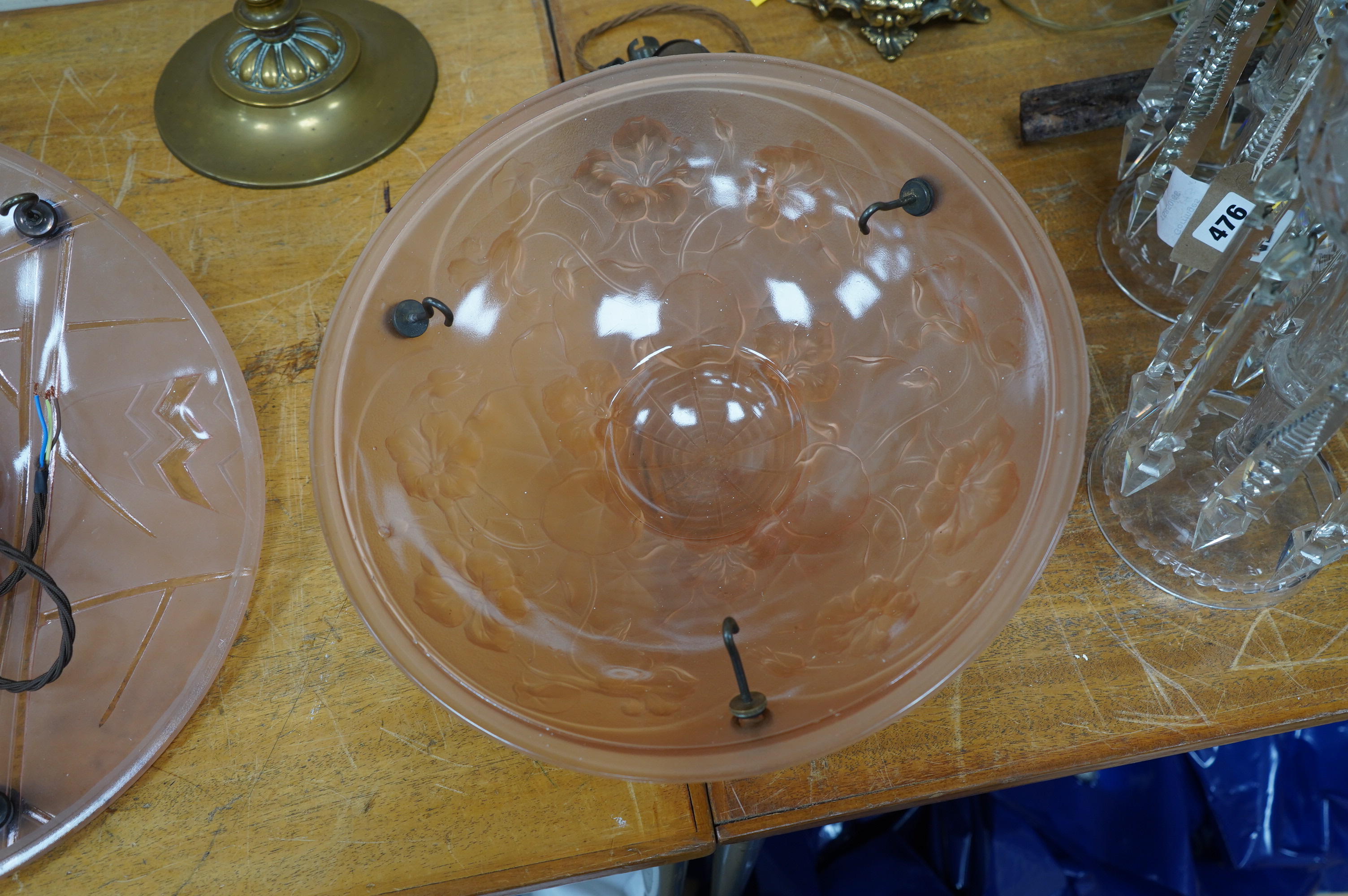 A French pink glass plaffonier ceiling lamp with antique brass fitting, chain and ceiling rose, circa 1930’s, wired, glass 35cm diameter, 13cm deep. Condition - good some minor chipping